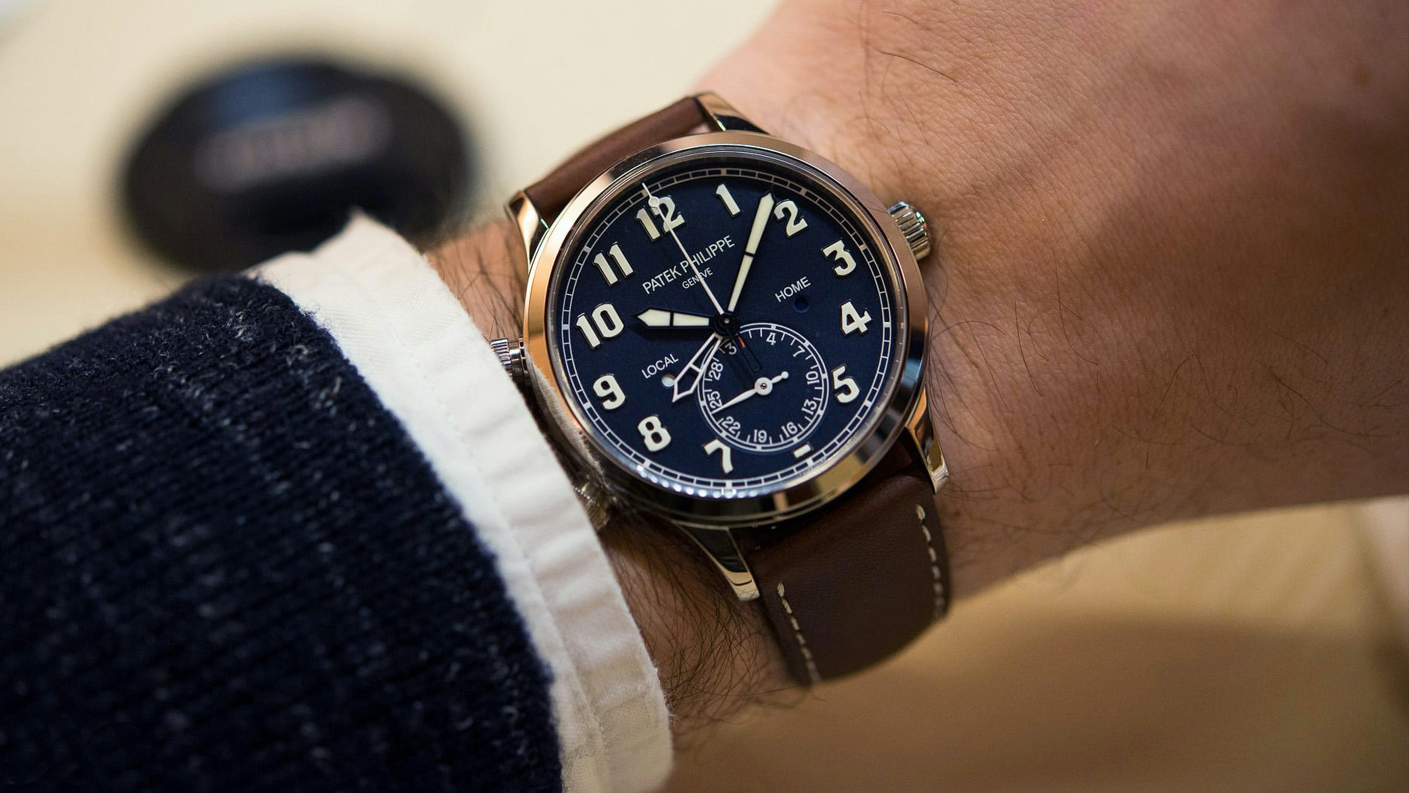 Patek Philippe 5524G Review: The Ultimate Calatrava Pilot Travel Time Watch